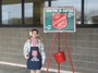 Jessica Melbourne working hard ringing the bell